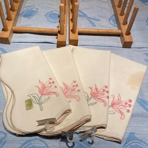 Set of 4 off white napkins with pink flower embroidered on edge. Never used
